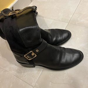 Black Cole Haan riding boots size 6.